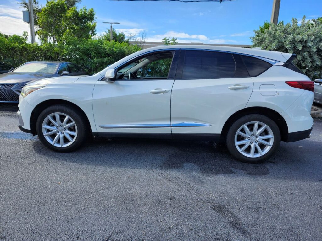 Thorough post accident repair inspection of a white Acura RDX to determine market loss for a diminished value appraisal in Homestead Florida.