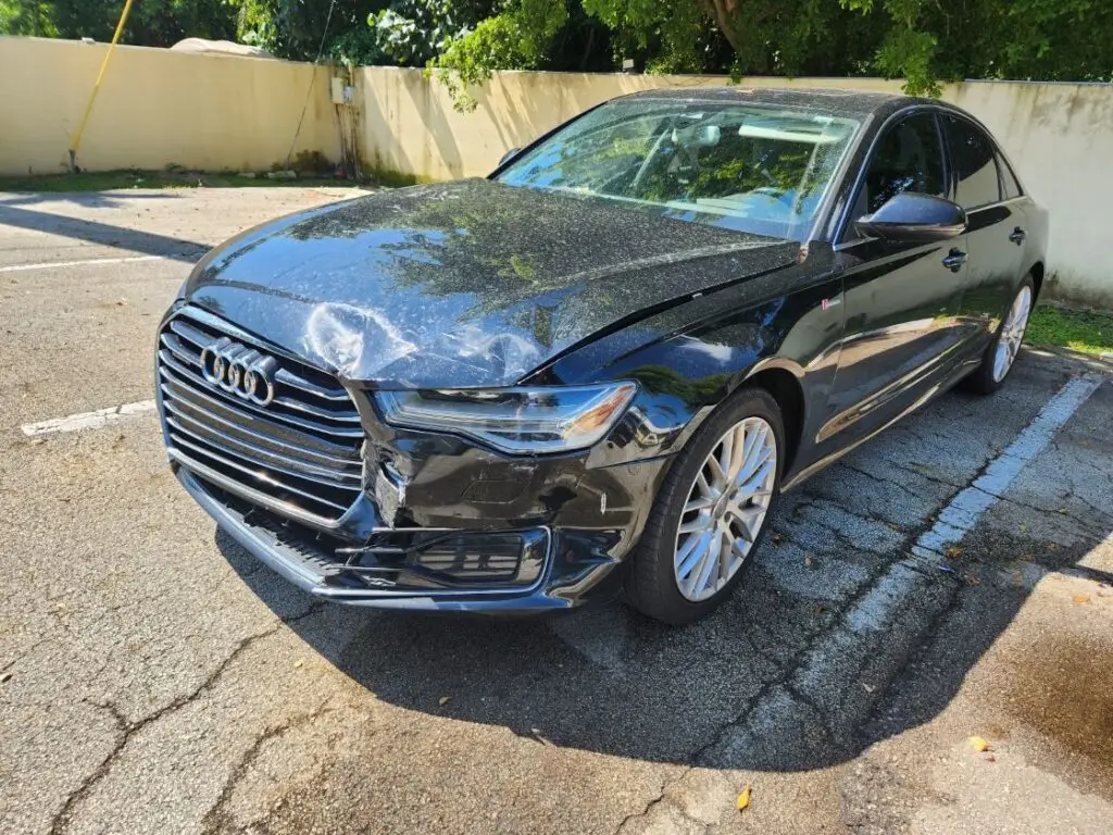 Professional Audi A6 front-end damage assessment for a diminished value appraisal West Palm Beach Florida to document collision impact on resale value.