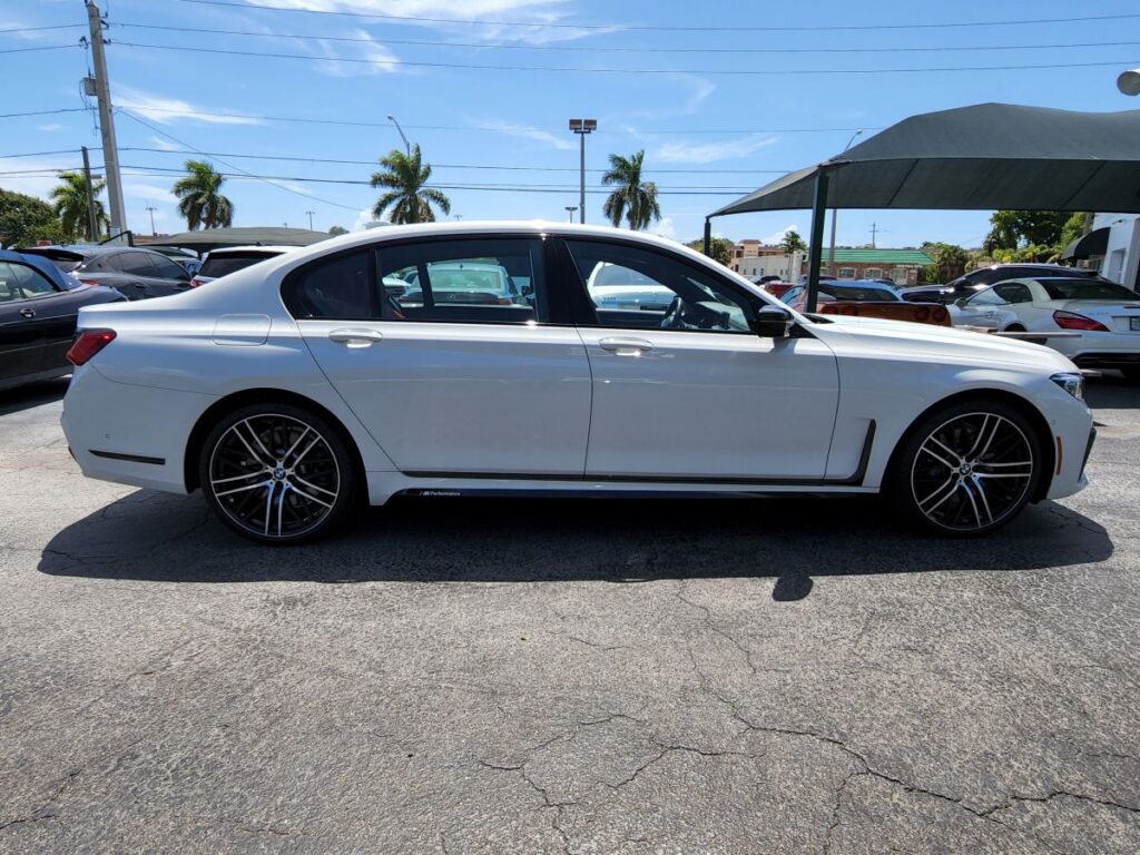 Detailed valuation of a white BMW 7 Series for a professional diminished value appraisal Lake Worth Florida.