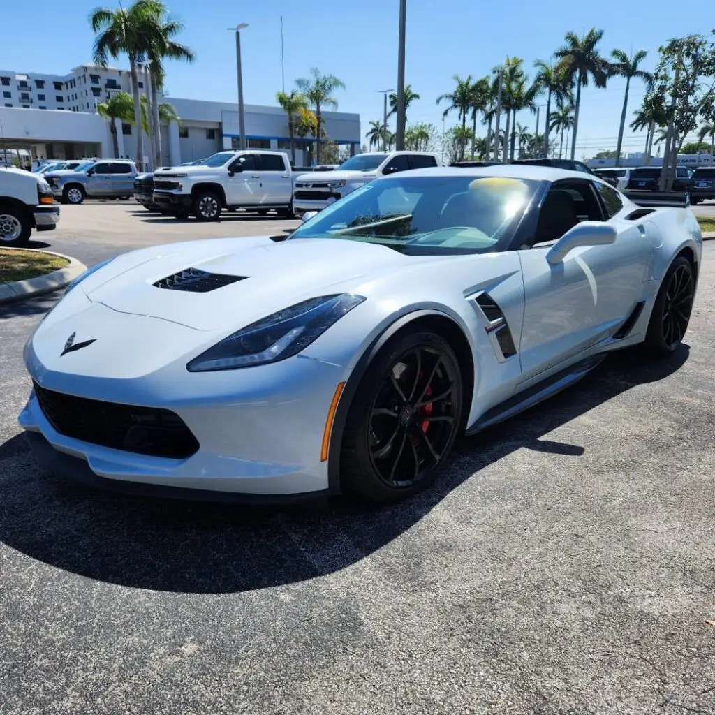 Front-angle market assessment of a white Chevrolet Corvette C7 Z06 for a certified diminished value appraisal in Wellington.
