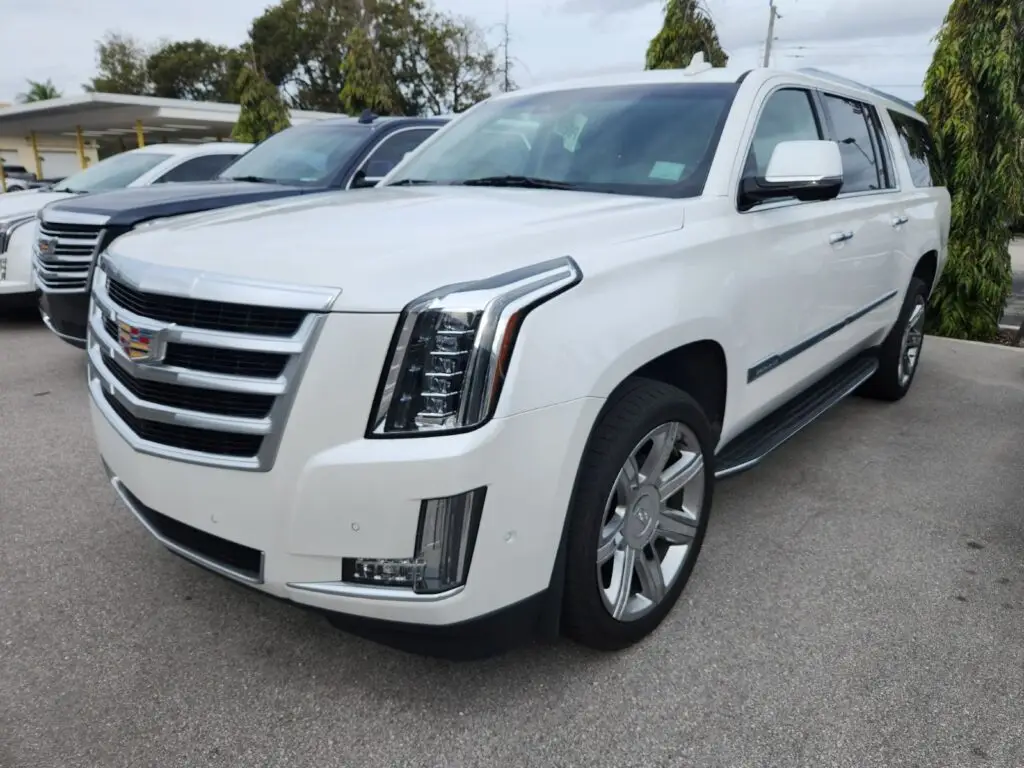 Front-view valuation of a white Cadillac Escalade ESV to support a certified diminished value appraisal in Coral Springs.