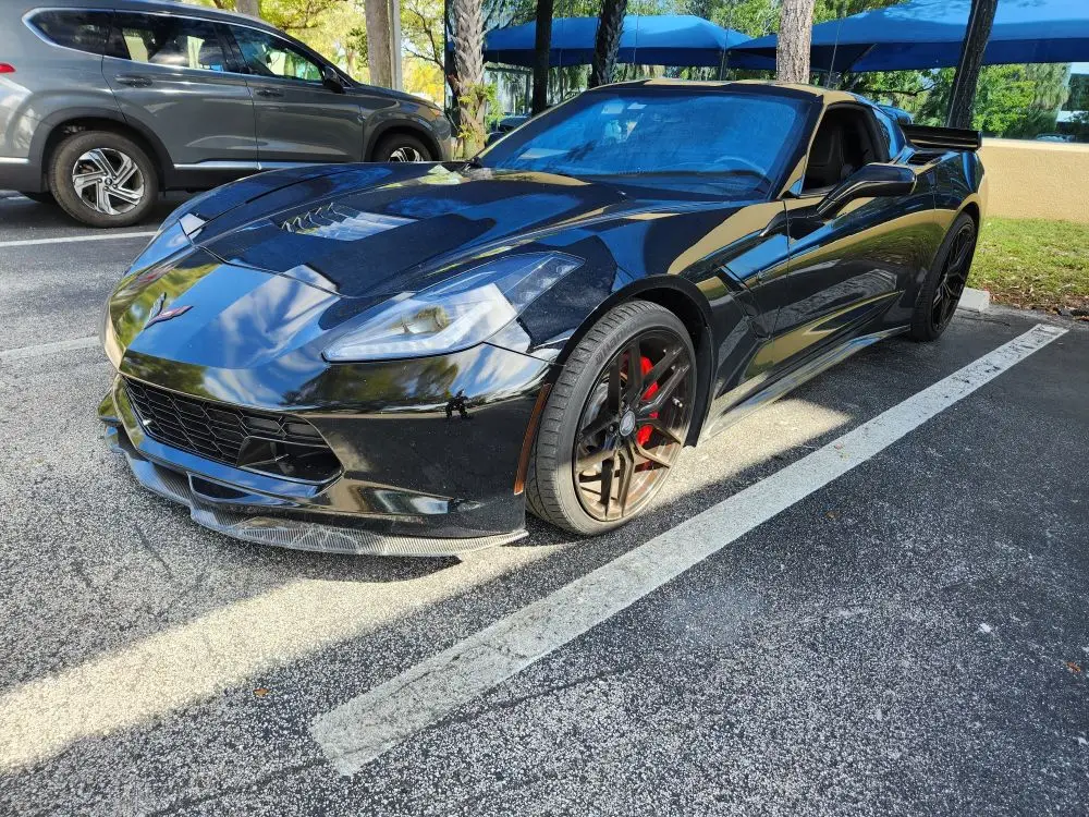 Front-view market valuation of a black 2019 Chevrolet Corvette C7 to support a certified diminished value appraisal Daytona Florida.
