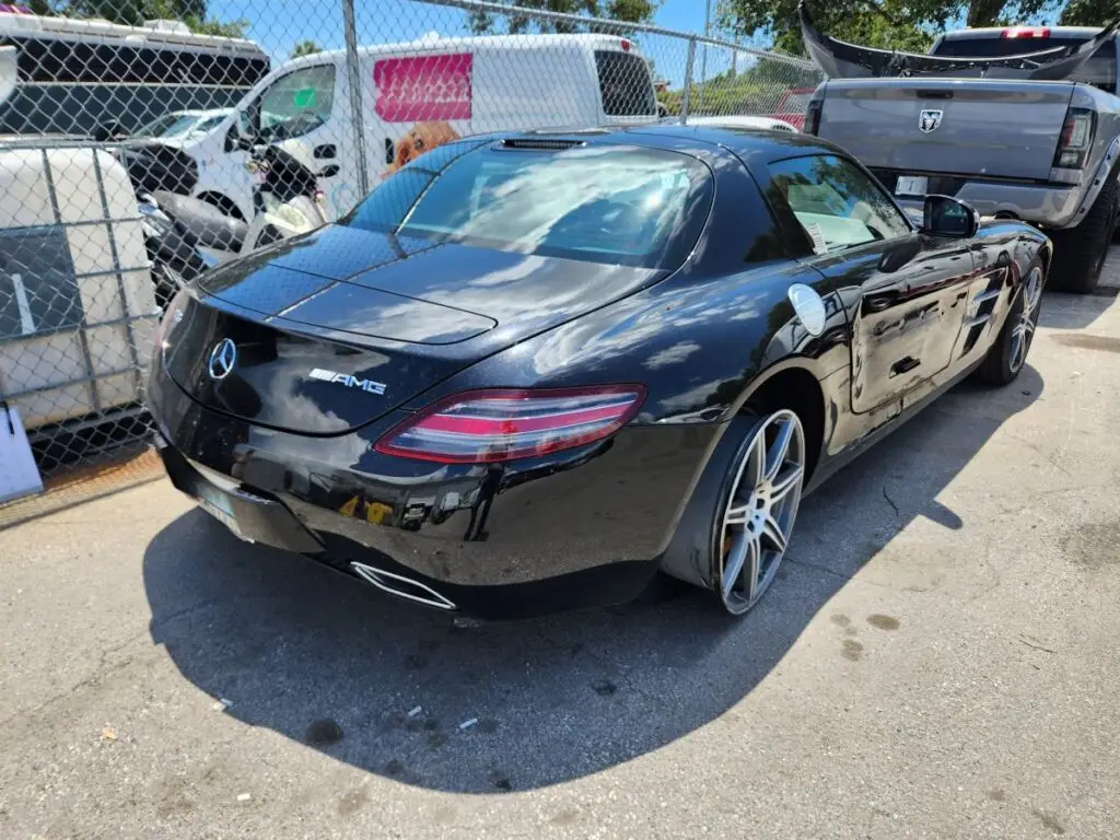 Documenting the market impact of side-impact repairs on a black 2012 Mercedes-Benz SLS AMG for a diminished value appraisal Fort Myers.