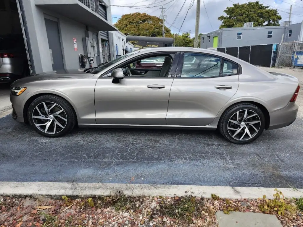 Side-profile market valuation of a champagne 2020 Volvo S60 to support a certified diminished value appraisal Fort Myers.