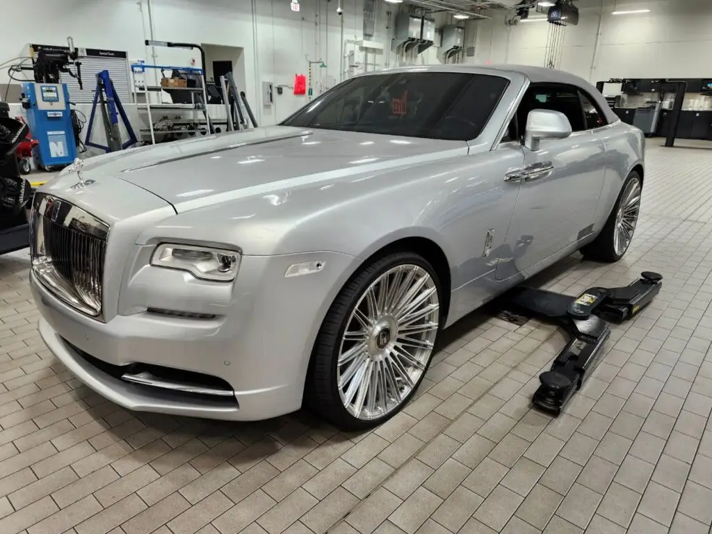 Assessing the market impact of collision repair history on a silver 2017 Rolls-Royce Dawn for a diminished value appraisal Naples Florida.