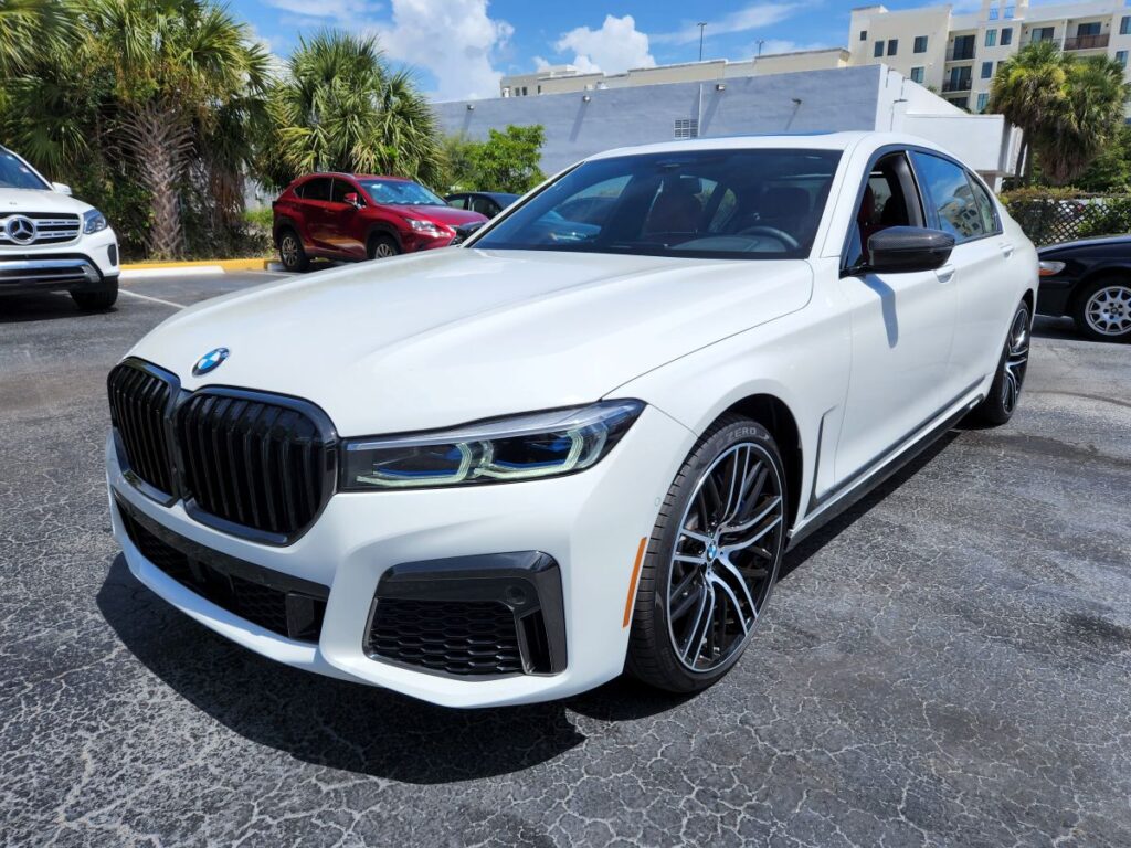 Front-angle market valuation of a white 2021 BMW 7 Series to support a certified diminished value appraisal in Palm Beach Gardens.