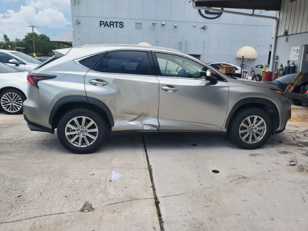 Documenting the market impact of side-impact collision repairs on a silver 2019 Lexus NX for a diminished value appraisal Royal Palm Beach.