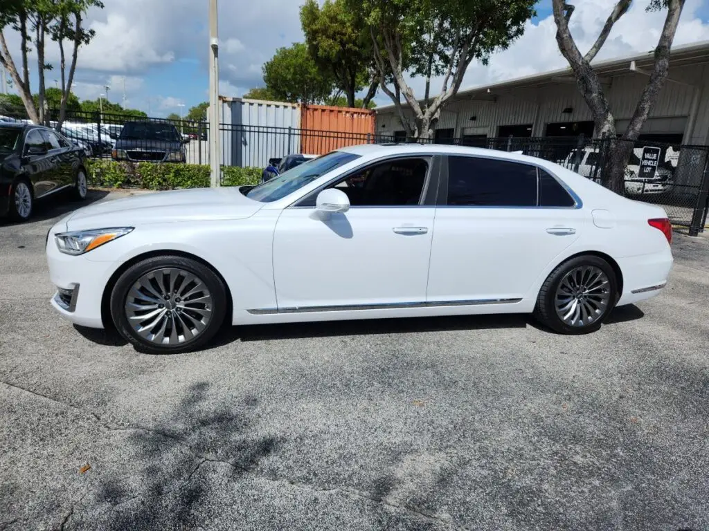 Side-profile market valuation of a white 2017 Genesis G90 sedan to support a certified diminished value appraisal Tampa.