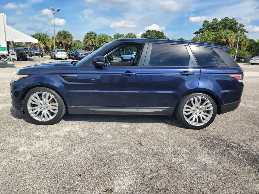 Side-view market valuation of a dark blue 2016 Range Rover Sport to support a certified diminished value appraisal Tampa Florida.