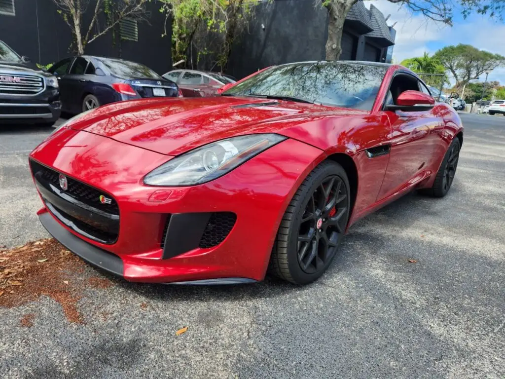 Evaluating the market stigma of accident history on a red Jaguar F-Type through a certified diminished value appraisal Pembroke Pines for exotic car owners.