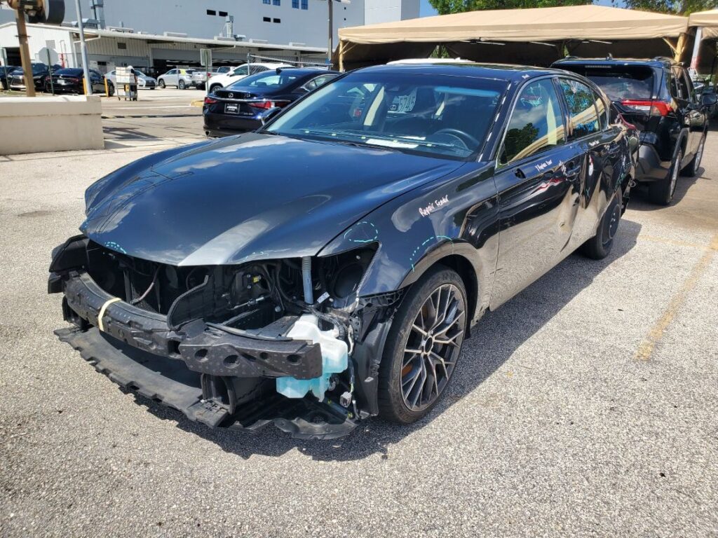 Front-end collision damage audit and repair assessment for a black Lexus ES 350 diminished value appraisal in Homestead Florida.