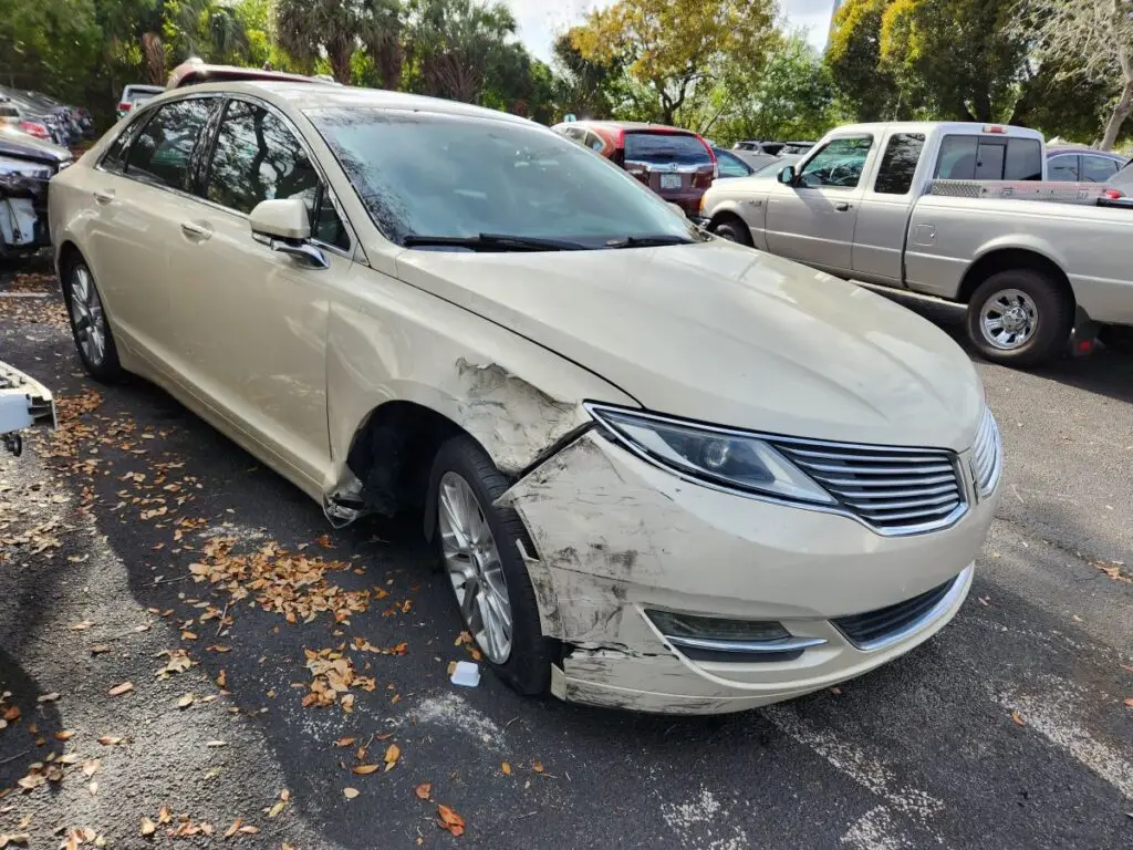 Structural assessment and front-end damage audit on a Lincoln MKZ for a diminished value appraisal Davie Florida.