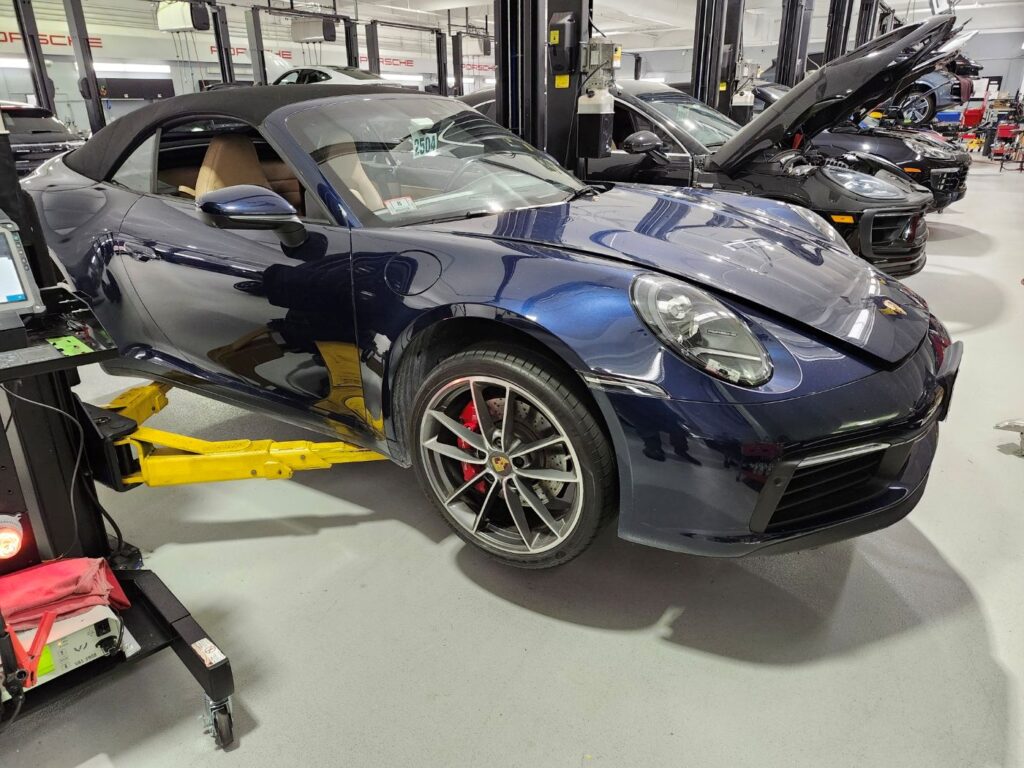 Blue Porsche 911 undergoing a diminished value appraisal by Auto Praise in Palm Beach to document car value loss after an accident despite high-quality repairs.