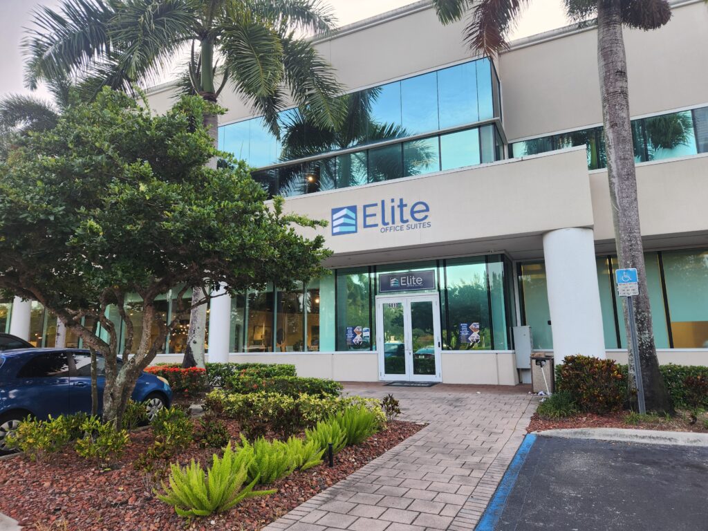 Auto Praise Vehicle Evaluation Services office exterior at Elite Office Suites, 6810 N State Road 7, Suite 332, Coconut Creek, Florida