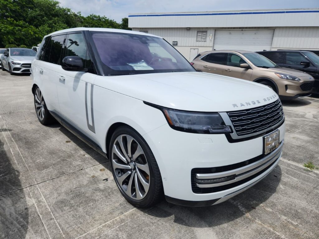 White 2023 Range Rover luxury SUV front three-quarter view photographed for exotic vehicle appraisal in Florida