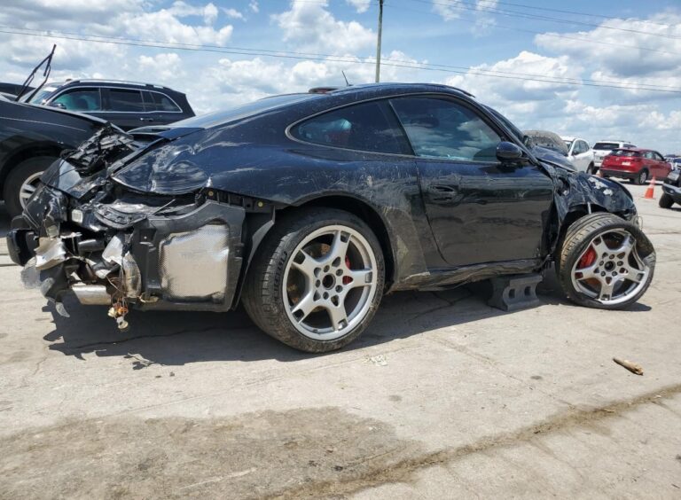 Porsche 911 coupe with severe front and rear collision damage assessed for total loss appraisal in Fort Lauderdale