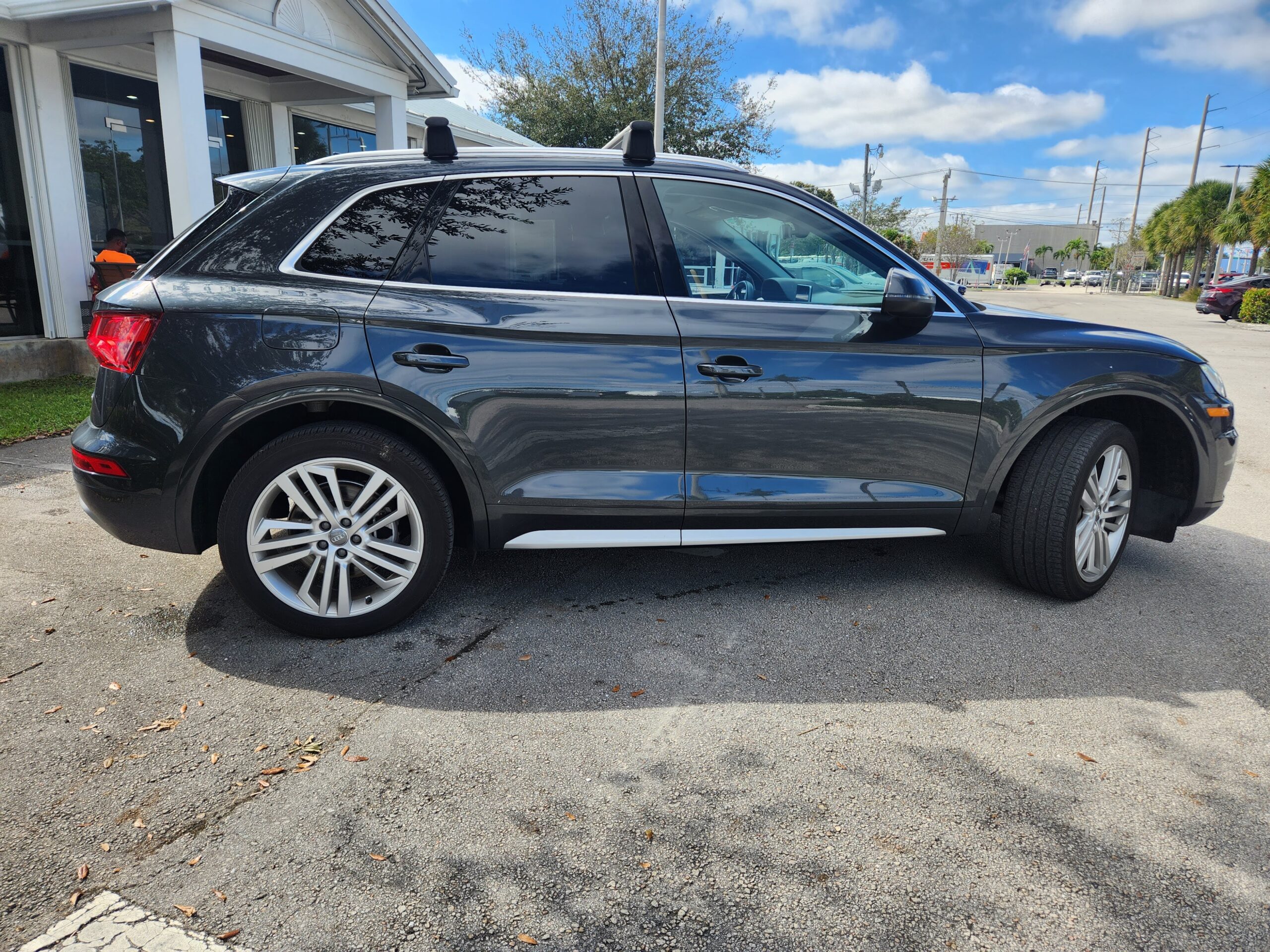 Audi Q5 luxury SUV side profile photographed in Jacksonville for total loss appraisal