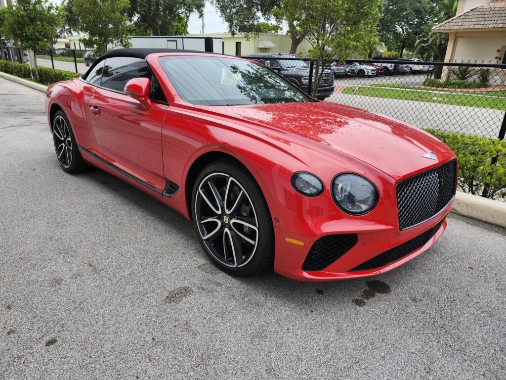 Bentley Continental GTC convertible with black wheels photographed in Sarasota for total loss appraisal