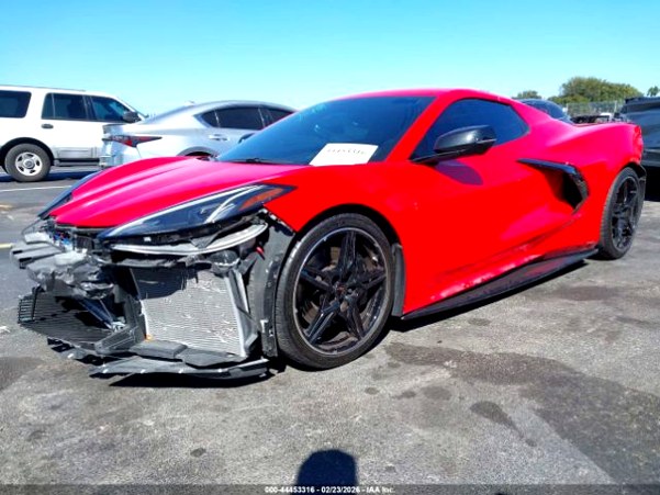 Chevrolet Corvette with front-end collision damage exposing radiator in Sarasota assessed for total loss appraisal