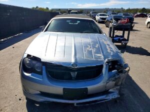 2005 Chrysler Crossfire convertible with passenger side front collision damage and cracked windshield assessed in Tallahassee for total loss appraisal.