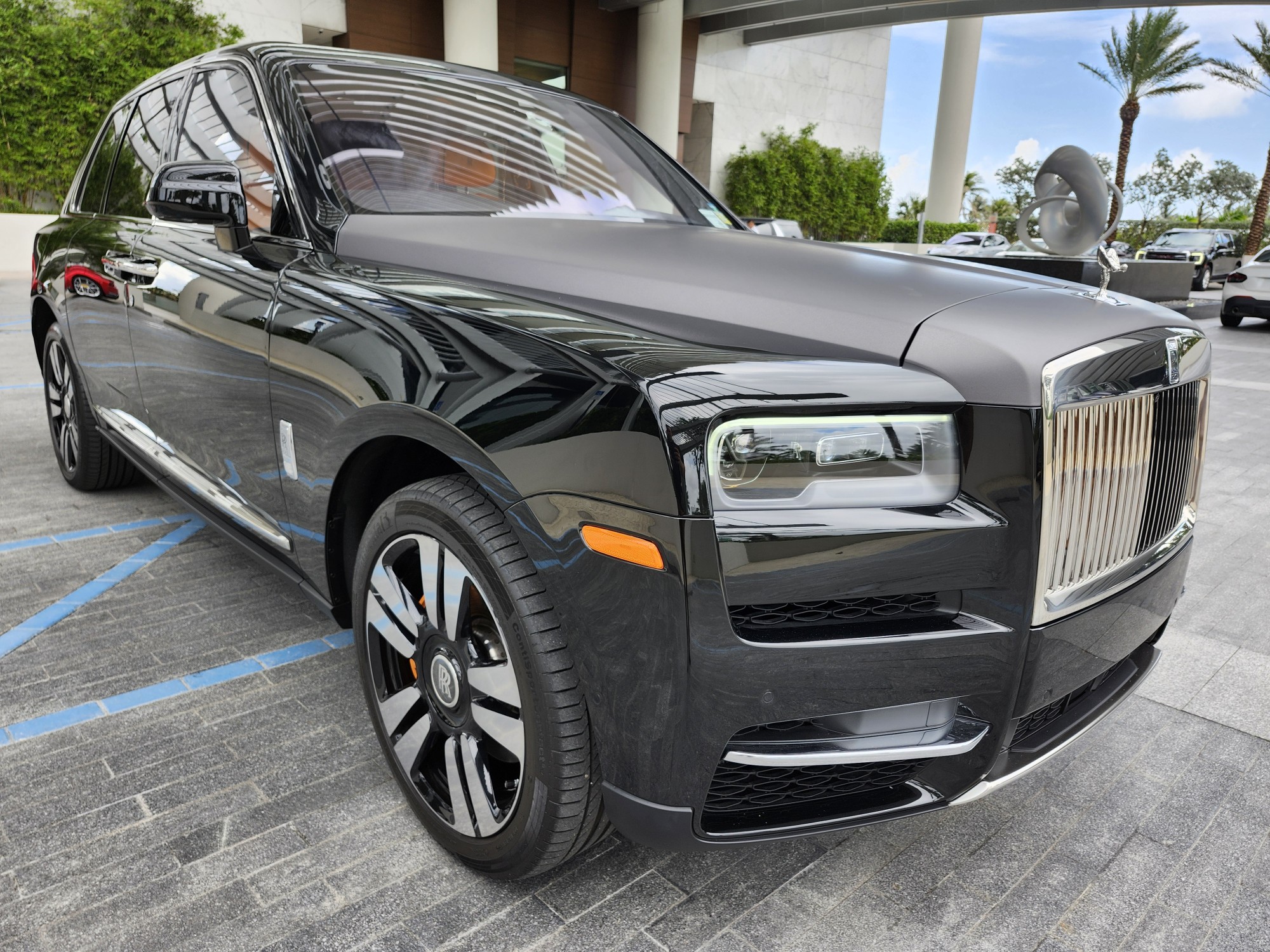 Rolls-Royce Cullinan luxury SUV with chrome grille photographed at Tampa for total loss appraisal