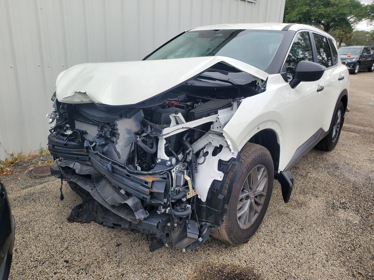White 2022 Nissan Rogue SUV with extensive front-end collision damage assessed for total loss claim