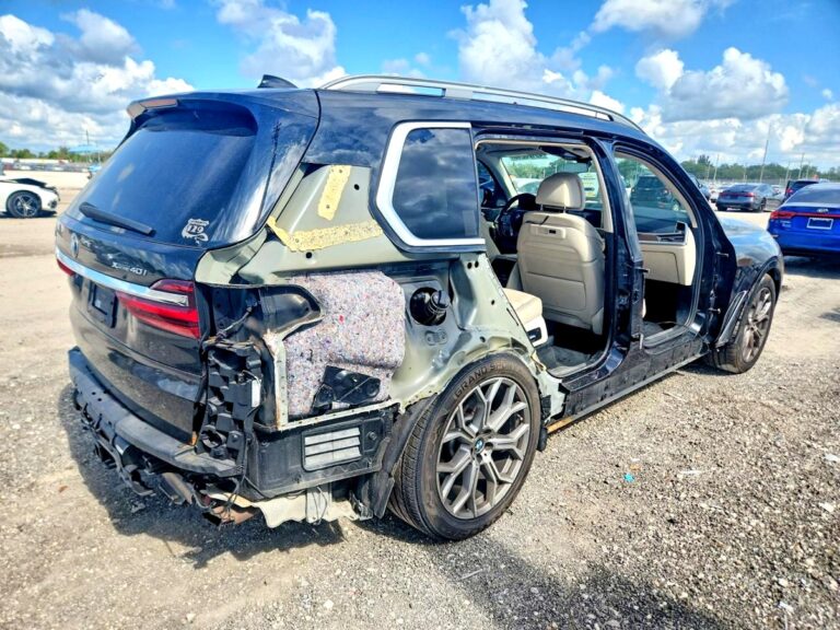 2020 BMW X7 with severe rear and passenger side collision damage exposing interior in Boca Raton for total loss appraisal