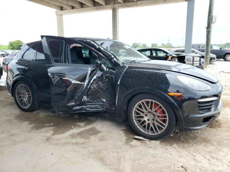 2013 Porsche Cayenne with severe driver side collision damage and shattered window in Jupiter assessed for total loss appraisal