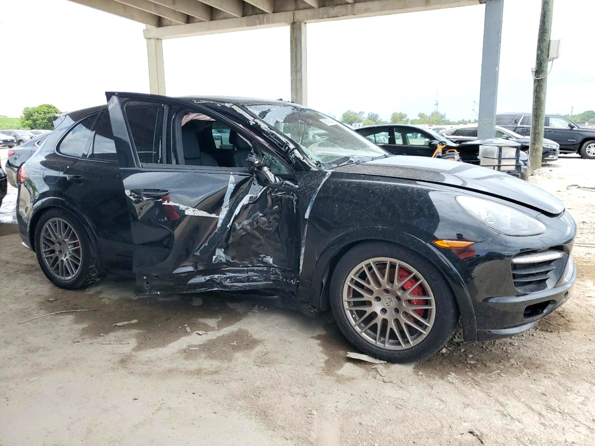 2013 Porsche Cayenne with severe driver side collision damage and shattered window in Jupiter assessed for total loss appraisal