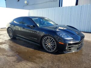 Black 2025 Porsche Panamera evaluated for total loss appraisal in Tampa, Florida