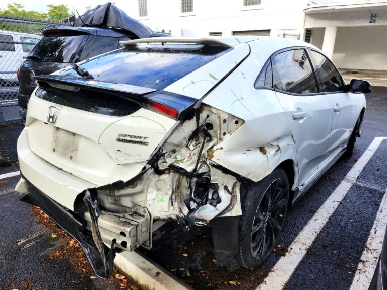 2017 Honda Civic Sport Touring with severe rear-end collision damage photographed in Weston Florida for total loss appraisal