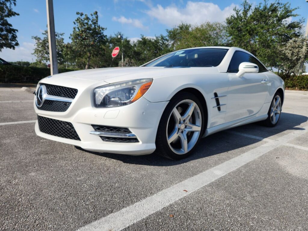 White Mercedes-Benz parked in a lot, evaluated for a diminished value appraisal in Royal Palm Beach, Florida