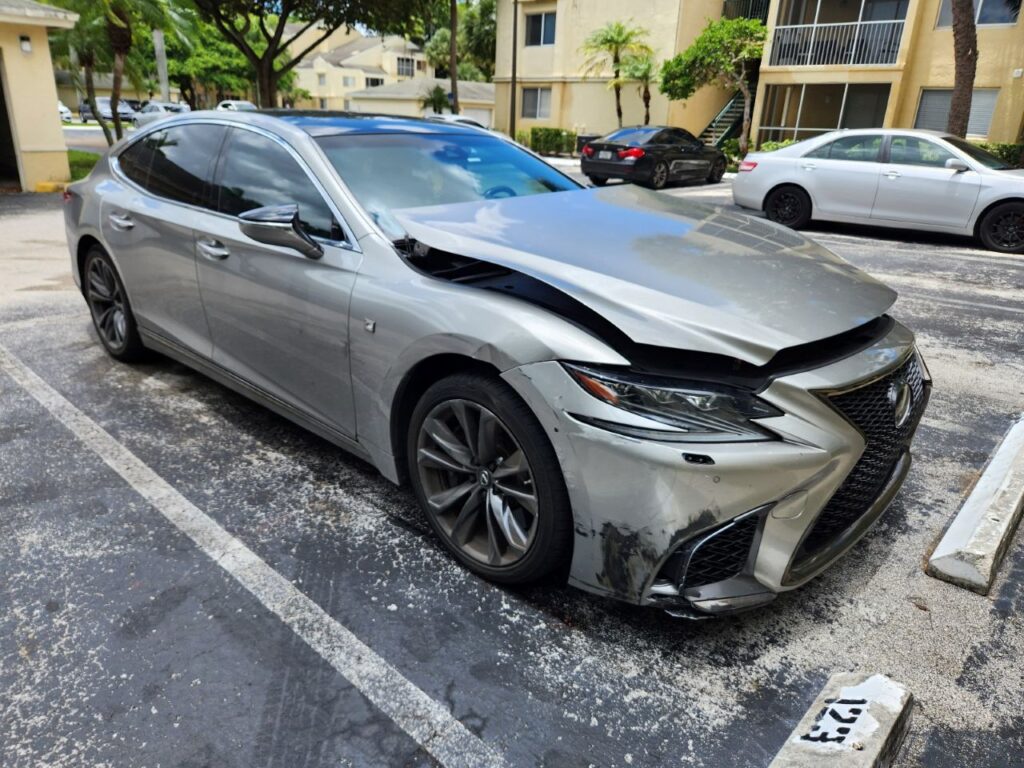 Silver Lexus LS 500 F Sport with front-end collision damage inspected for a diminished value appraisal in Fort Lauderdale, Florida